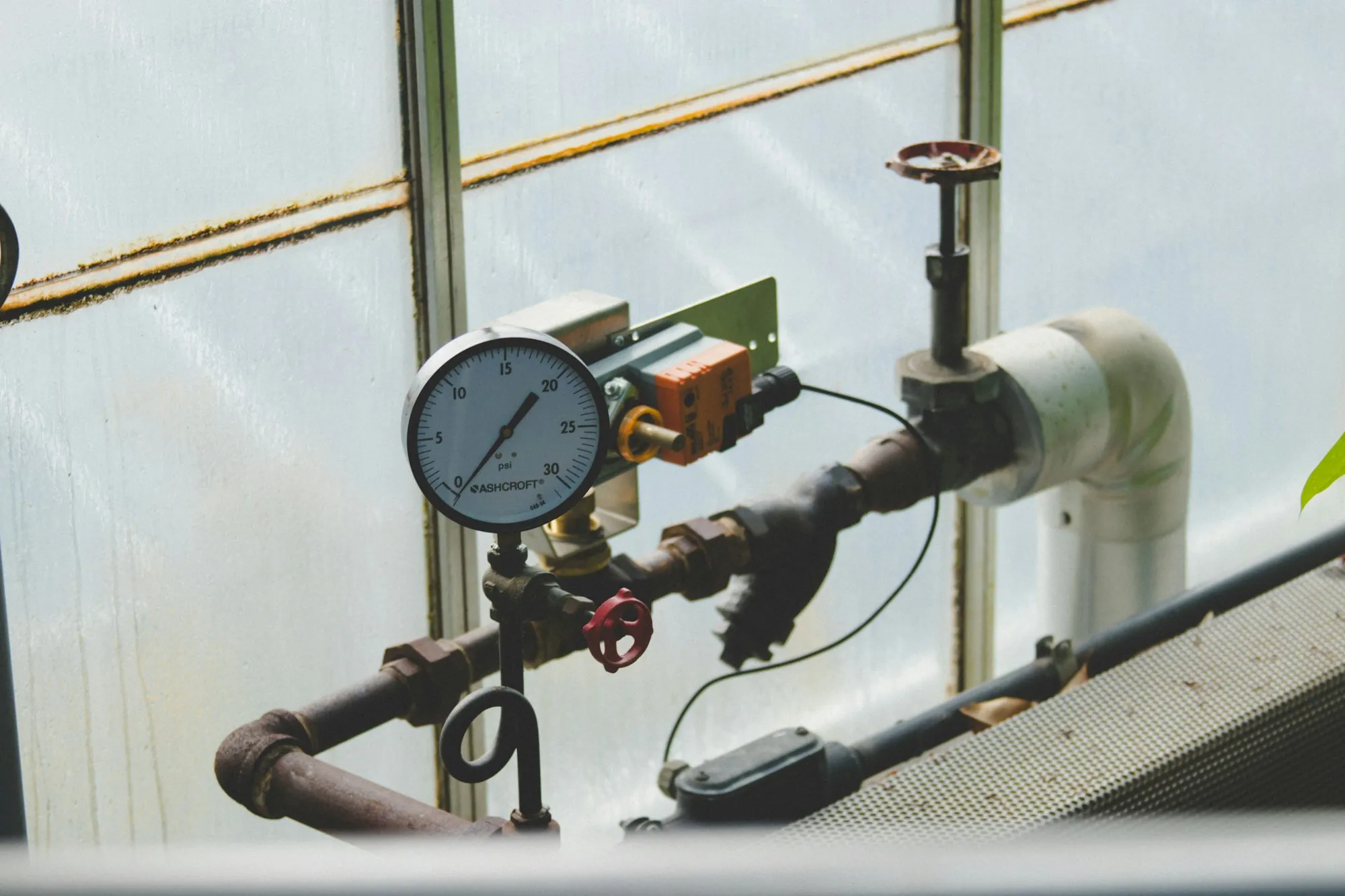 Water Filter Repair & Maintenance in Newport Beach Pressure gauge fitted to water pipes
