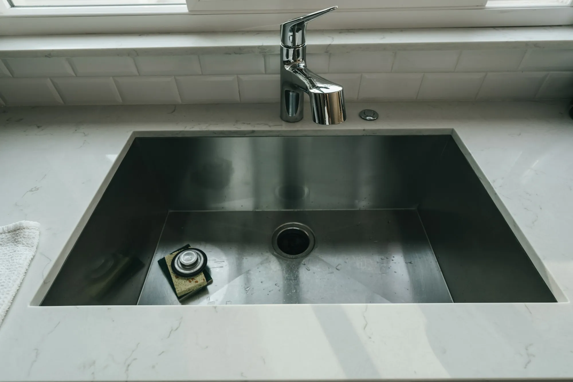 Water Softener Installation in Newport Beach Stainless steel kitchen sink and faucet